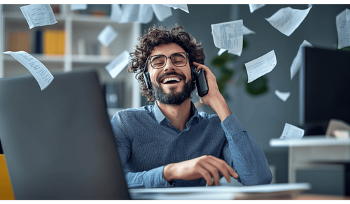 Une personne heureuse avec des papiers qui volent car il se débarrasse de tous ces rapports papiers car il les a digitalisé. Il n'a plus de papier à gérer donc plus de temps pour lui et son activité  